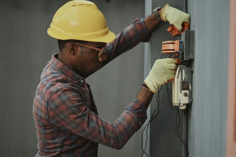 contractor working on flat rate pricing for electrical services